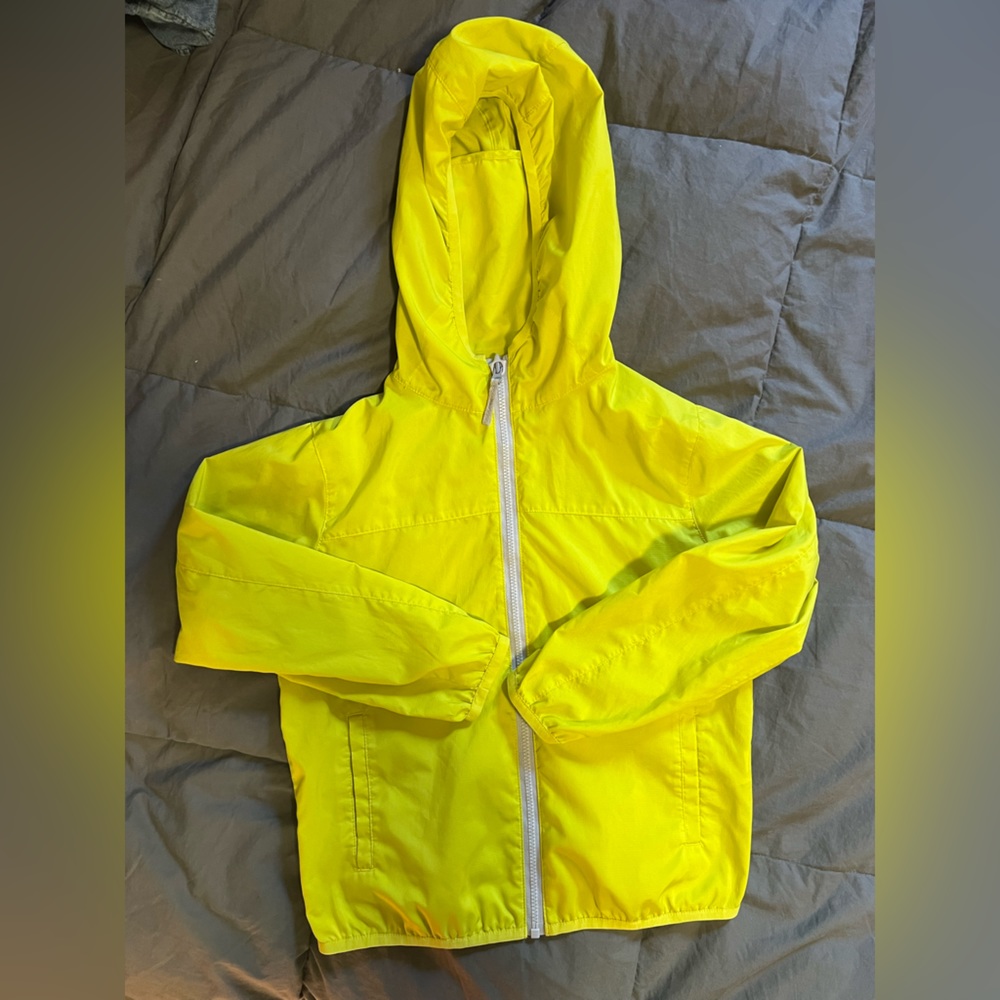 Neon yellow uniqlo very light wind jacket